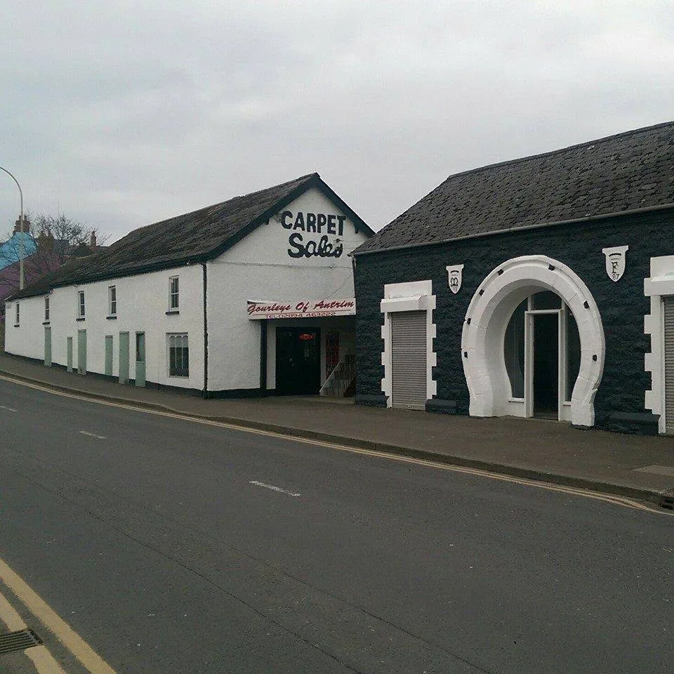 An earlier photograph of Gourley's carpet showroom on Massereene Street, Antrim